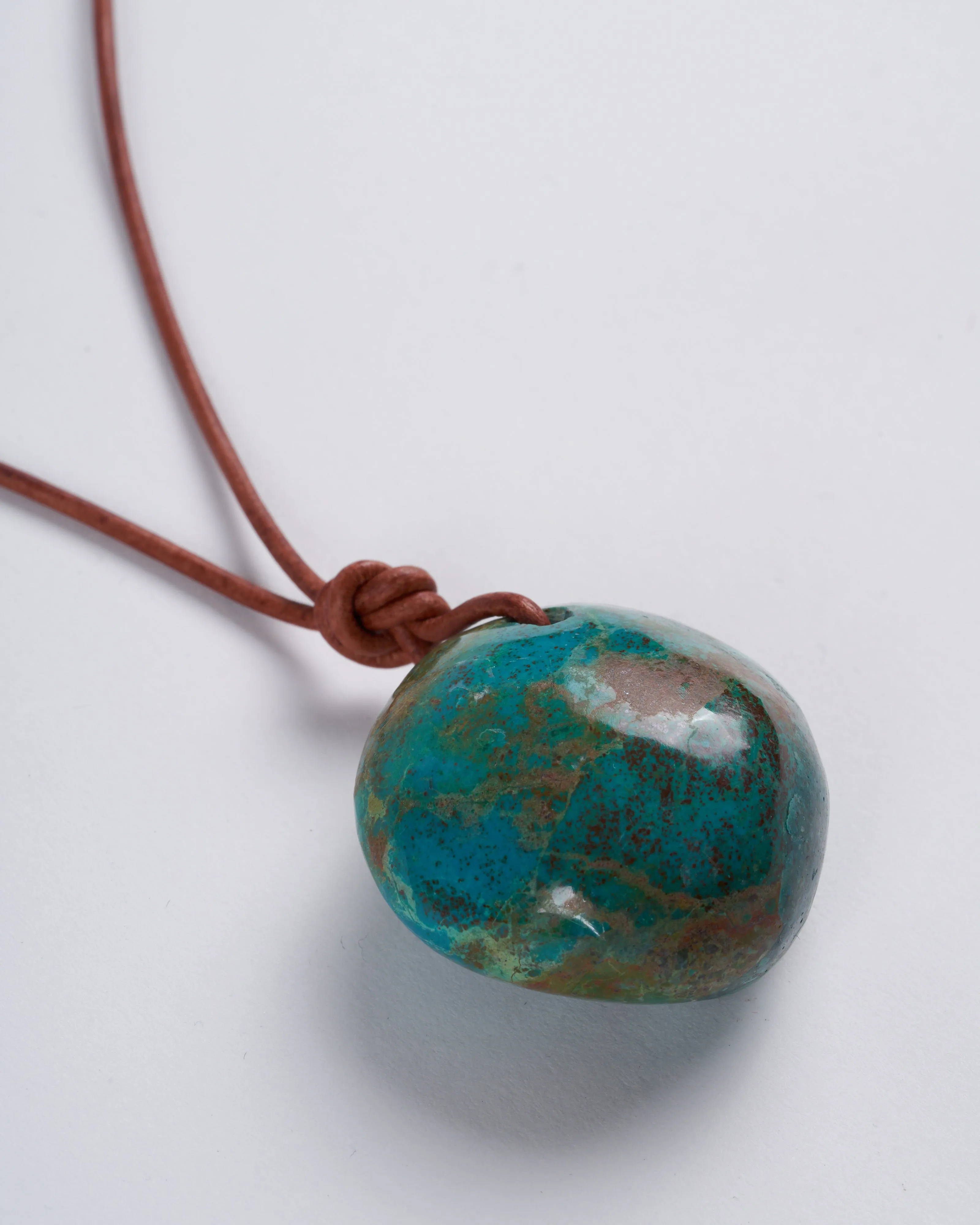 chrysocolla on leather - stone green