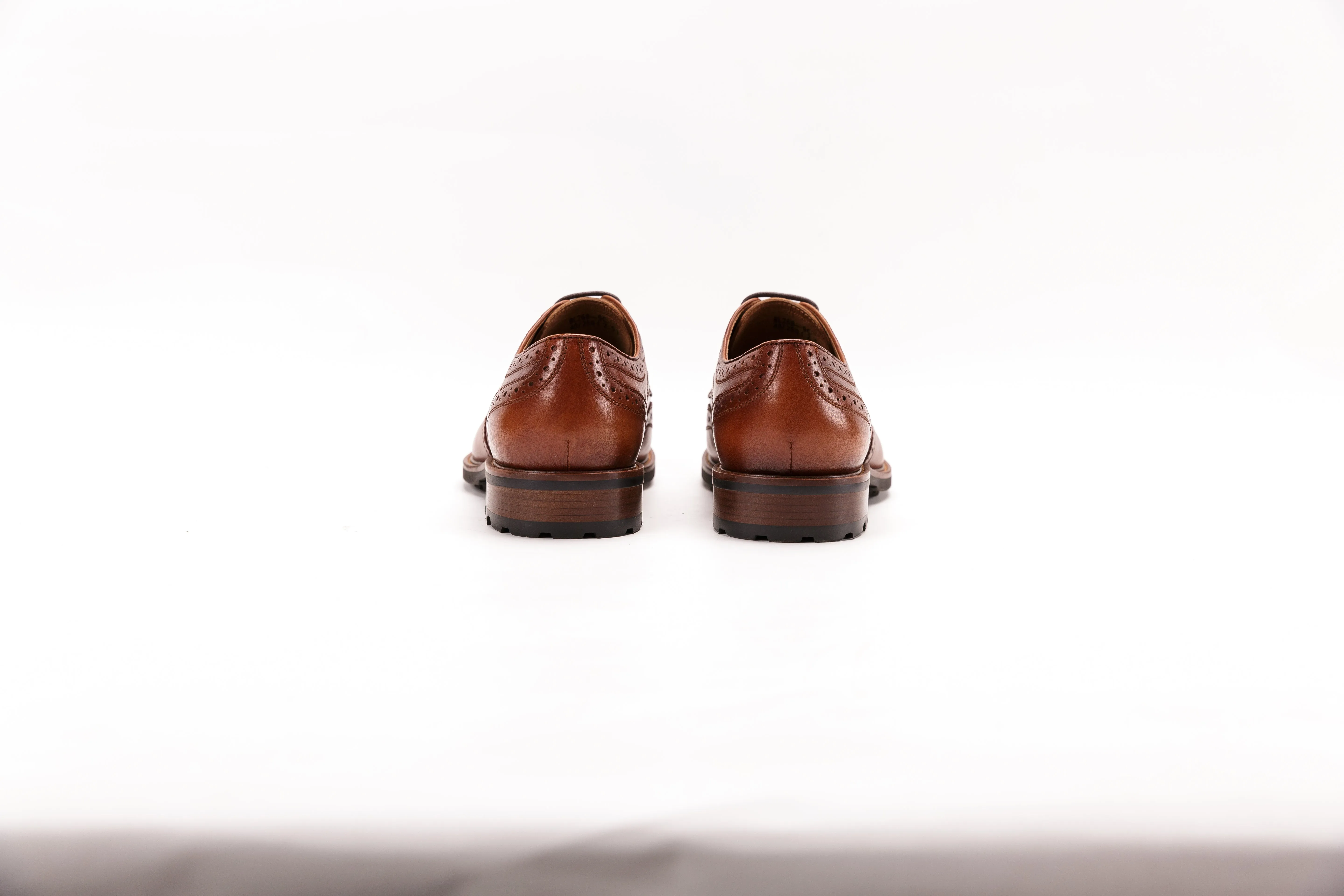 England Brock carved vintage leather shoes
