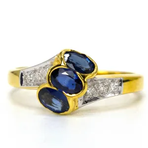 Estate Three Stone Bypass Ring with Sapphires and Diamonds in 18K Gold