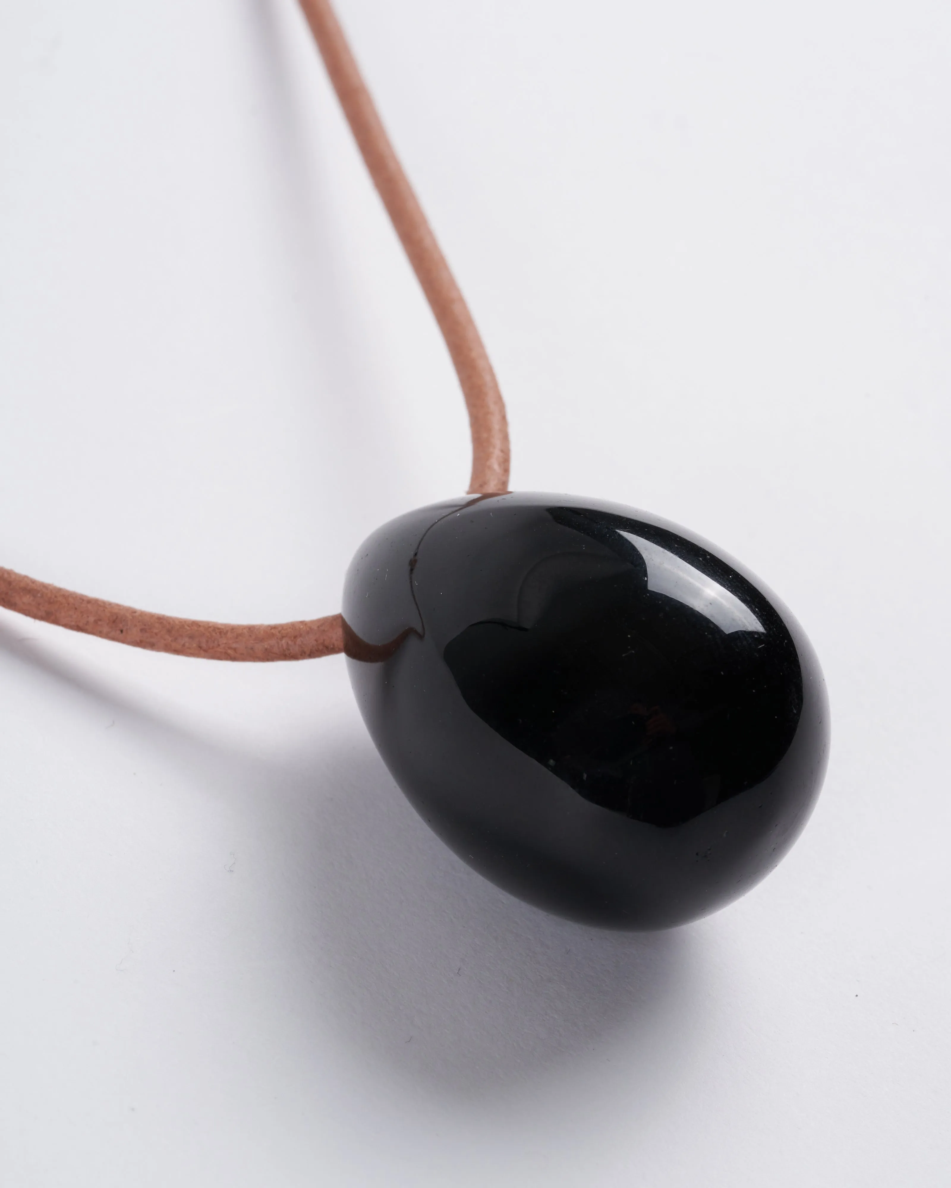 large obsidian egg on 3mm leather - stone black