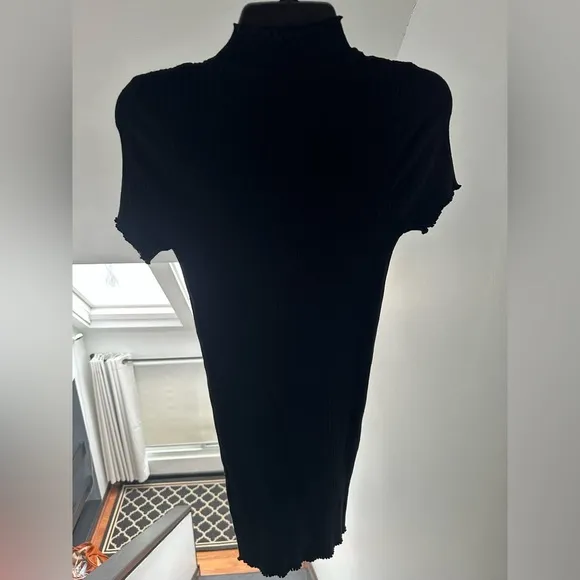 LBD little black dress with short sleeves, high neck, and ribbed bodycon