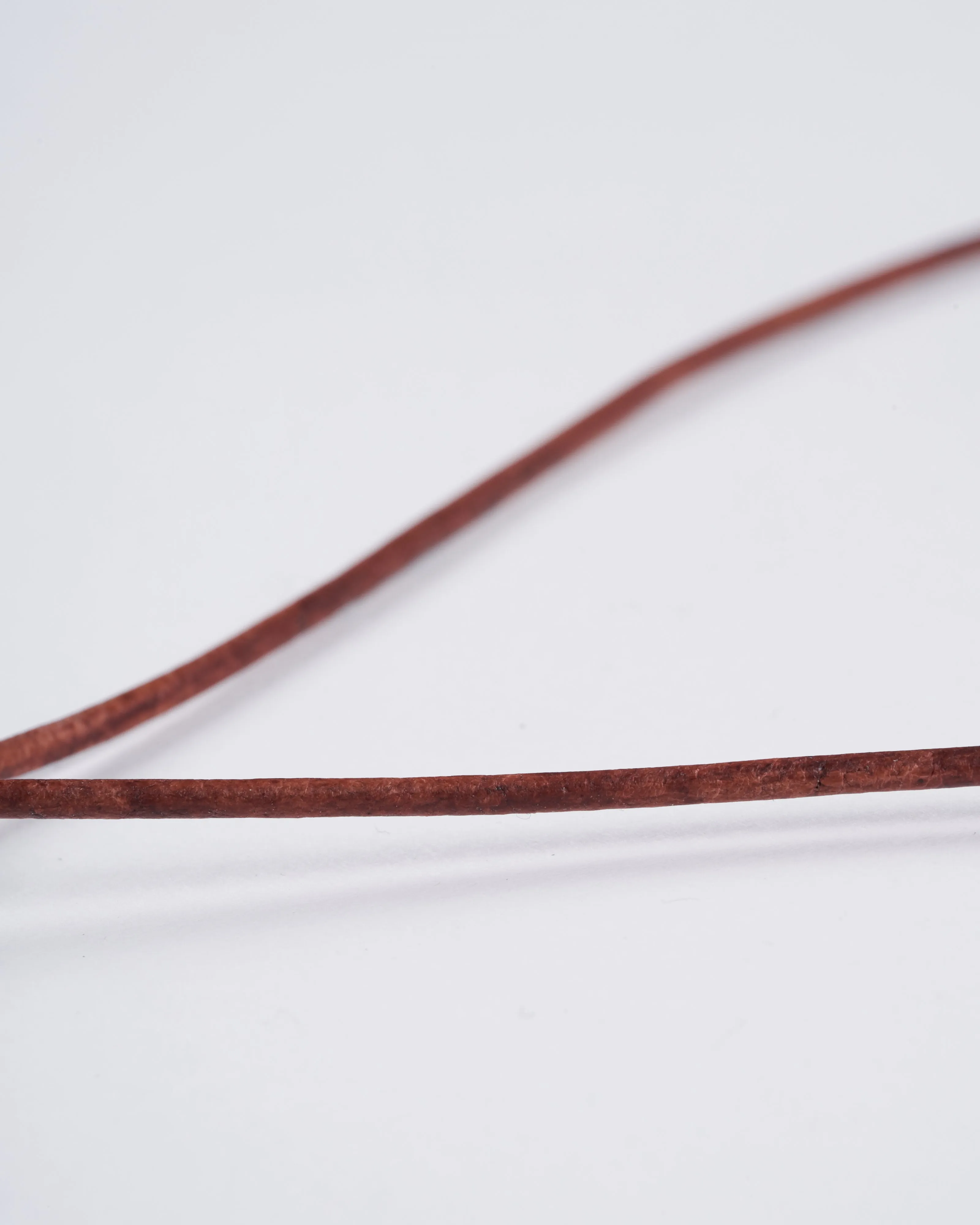 medium obsidian egg on 2mm leather - stone black