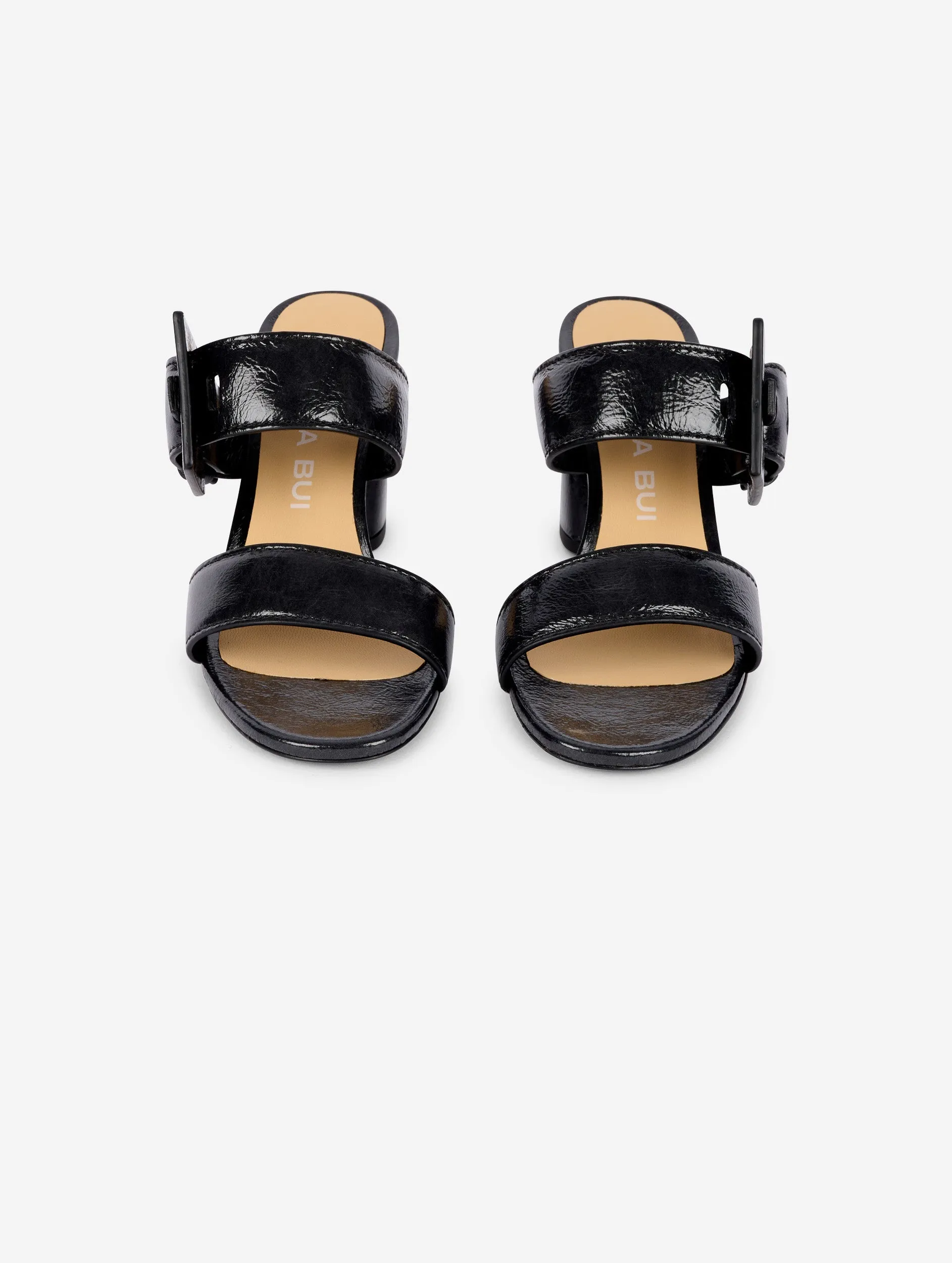 Mules in navy patent leather