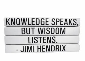 "KNOWLEDGE SPEAKS, BUT WISDOM LISTENS" Quote Book Stack