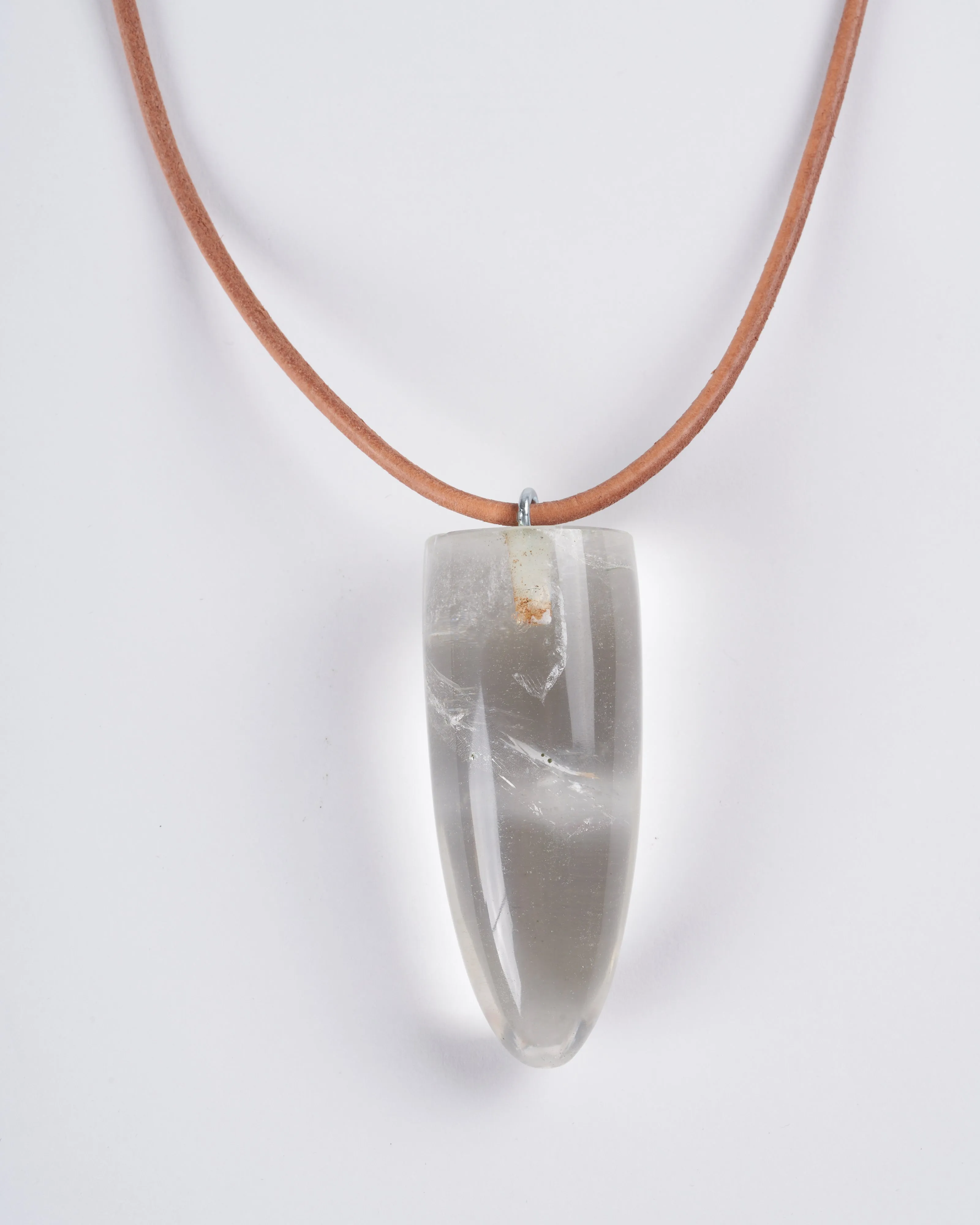 rock crystal bullet with eye pin on leather - stone clear